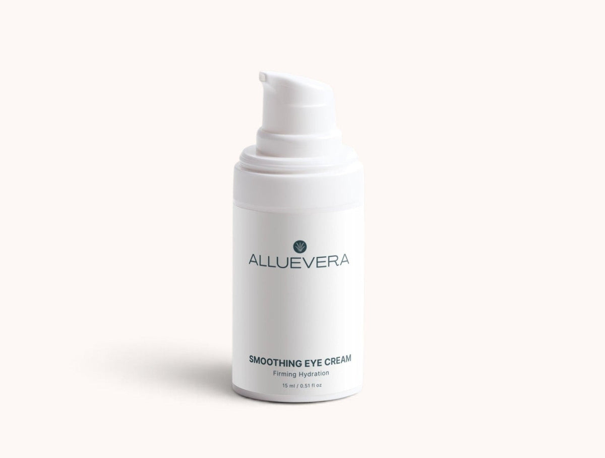 A white pump bottle of Alluevera Smoothing Eye Cream on a clean, solid off-white background.